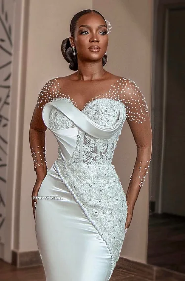Tenue de mariage femme africaine pour invitée — grand boubou, bazin et wax sur-mesure By Daavi Dakar